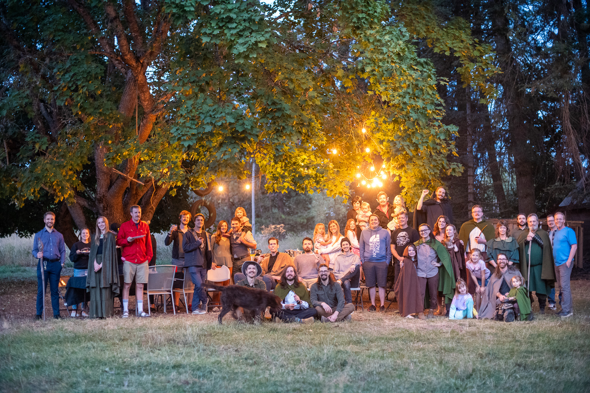 A costumed group gathered together at a past celebration on the farm